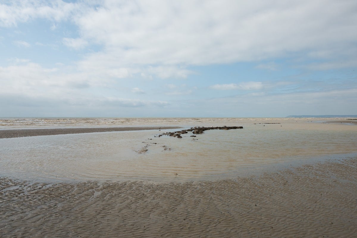 Sandy beach on a cloudy day